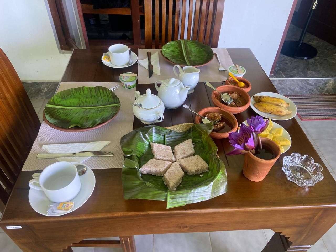 Traditional Sri Lankan breakfast spread on banana leaf