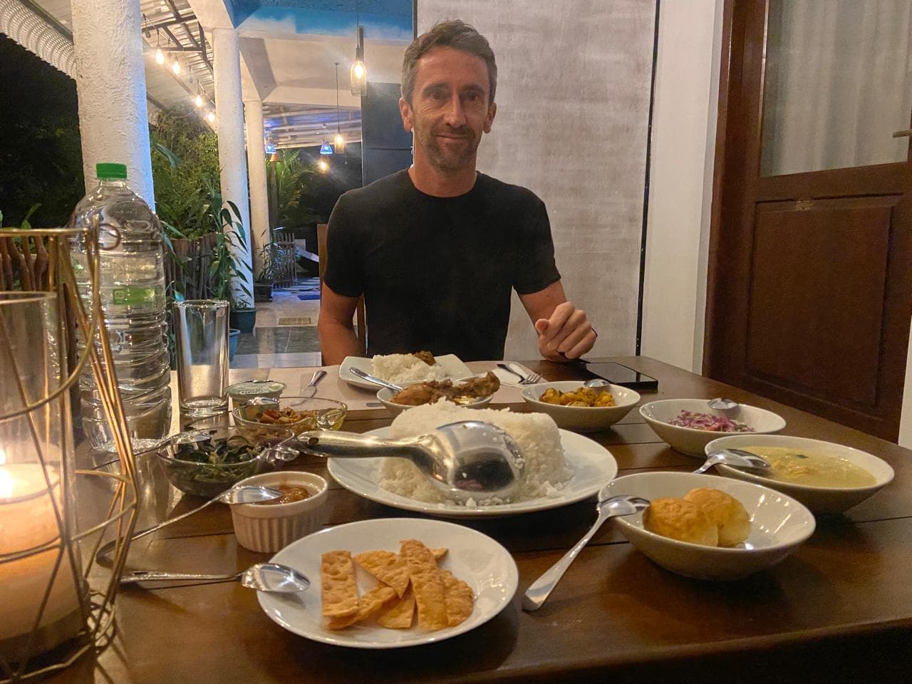 A guest enjoying a home-cooked dinner